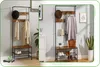 Two identical hallway coat racks are shown side-by-side in a room setting, demonstrating different styling options. Podgląd zdjęcia produktu