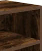A close-up view of the shelves of a wooden bookcase. Produktbild-Vorschau