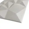 A close-up, angled view of a white 3D wall panel with a geometric pattern. Anteprima dell’immagine prodotto