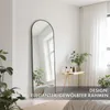 A full-length mirror in a bedroom setting, reflecting a window and a bed. Produktbild-Vorschau