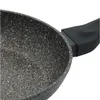 Close-up view of the interior and handle of a granite frying pan. Anteprima dell’immagine prodotto