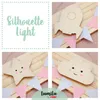 A collage of four images showing wooden silhouette night lights in the shapes of a rocket, a star, and a cloud, along with decorative bunting and text. Náhled obrázku produktu