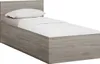 A single bed with a headboard, mattress, and bedding, shown from a side-angle against a white background. Náhled obrázku produktu