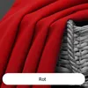 A close-up of red fabric draped over a wicker basket. Produktbild-Vorschau
