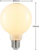 A close-up, studio shot of a globe-shaped LED light bulb with dimensions indicated. Produktbild-Vorschau