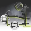 A black and gray multi-functional training bench with yellow highlights emphasizing its structure and features, presented against a smoky dark gray background. Produktbild-Vorschau