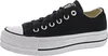 A side view of a black Converse platform sneaker. Voir les images du produit