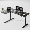 A black L-shaped standing desk with a laptop, monitor, keyboard, mouse, headphones, a plant, and a cup of coffee. Produktbild-Vorschau