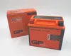 A product shot of a motorcycle battery and its packaging against a neutral background. Anteprima dell’immagine prodotto