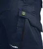A close-up view of the side pocket and logo on a pair of navy blue work shorts. Produktbild-Vorschau
