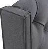 Close-up of the corner of a gray tufted upholstered bed frame. Produktbild-Vorschau