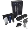 An Oral-B iO 9 electric toothbrush and its accessories are laid out on a white surface, with the product box in the background. Produktbild-Vorschau