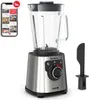 A blender and its accessories are displayed on a white background, with a smartphone showing recipes in the background. Voir les images du produit