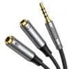 A close-up studio shot of a Ugreen audio splitter cable against a white background. Podgląd zdjęcia produktu