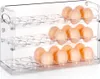 A clear, well-lit studio shot of a three-tiered egg holder filled with beige eggs, placed on a white background. Náhled obrázku produktu