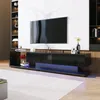 A modern living room with a TV stand and a large TV mounted on the wall. Produktbild-Vorschau