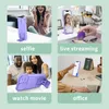 A collage of four images showing a purple phone case being used in different scenarios: taking a selfie, live streaming, watching a movie, and at an office desk. Produktbild-Vorschau