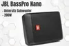 A JBL BassPro Nano subwoofer is shown on a white and light gray background with hexagonal patterns. Voir les images du produit