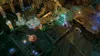 An overhead view of a battle scene in a video game, with characters fighting in a stone ruin. Produktbild-Vorschau