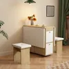 A dining set with a foldable table and two stools in a room. Produktbild-Vorschau