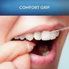 Close-up of a person's mouth flossing their teeth. Produktbild-Vorschau