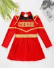 A cheerleader dress laid flat on a white background with some greenery and flowers in the upper left corner. Náhľad obrázku produktu