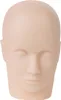 A close-up, front-facing view of a bald mannequin head, likely used for training purposes. Produktbild-Vorschau