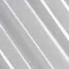 A close-up of white fabric with diagonal stripes, likely a curtain or drapery. Voir les images du produit