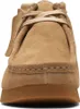 A close-up, front-facing view of a tan suede shoe. Produktbild-Vorschau