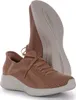 A pair of tan Skechers sneakers are shown from a slightly elevated side angle against a white background. One shoe is in the foreground, and the other is positioned behind and slightly to the right, showing its sole. Produktbild-Vorschau