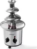 A stainless steel chocolate fountain with three tiers and two control knobs on a white background. Podgląd zdjęcia produktu