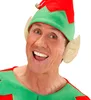 A man wearing an elf hat and ears, smiling. Produktbild-Vorschau
