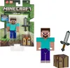 A Minecraft Steve action figure in its packaging, with additional accessories shown separately. Produktbild-Vorschau