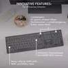 A keyboard is shown on a desk with some office supplies. Produktbild-Vorschau