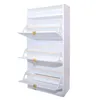 A white shoe cabinet with three flip-down doors, each with a wooden bar and a gold handle. The cabinet is shown against a white background. Náhľad obrázku produktu