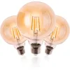 Three amber glass LED light bulbs with visible filament elements are arranged in a cluster against a white background. Produktbild-Vorschau