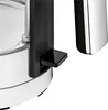 A close-up view of a black pedal on a silver and black appliance. Anteprima dell’immagine prodotto