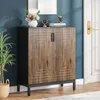 A shoe cabinet is shown in a hallway next to a door and a plant. Voir les images du produit