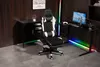 A gaming setup with a chair, desk, and computer. Produktbild-Vorschau
