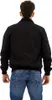 A person wearing a black jacket and blue jeans, viewed from the back. Produktbild-Vorschau