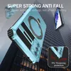 A phone case with a ring stand is shown against a blurred background of tall buildings. Anteprima dell’immagine prodotto