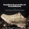 A person wearing a tan safety shoe is shown in a close-up shot, with metal shavings scattered around the shoe. Produktbild-Vorschau