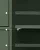 Close-up of a dark green cabinet interior showing shelves and drawer fronts. Náhled obrázku produktu