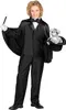 A young boy dressed as a magician, holding a wand and a top hat with a rabbit inside. Produktbild-Vorschau