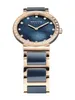 A close-up studio shot of a Bering Ceramic women's watch with a blue mother-of-pearl dial and rose gold accents. Náhľad obrázku produktu