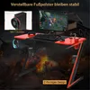 A gaming desk with a computer setup, surrounded by a dramatic, fiery background suggesting an intense gaming environment. Produktbild-Vorschau