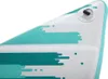 A close-up view of the nose of an inflatable paddleboard, showing its textured surface and teal and white abstract design. Produktbild-Vorschau