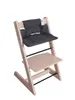 A high chair cushion set on a wooden high chair. Voir les images du produit
