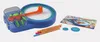 A spiral designer toy kit with pens and gears is laid out on a light gray background. Podgląd zdjęcia produktu