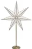 A white star-shaped lamp with gold trim on a stand. Podgląd zdjęcia produktu